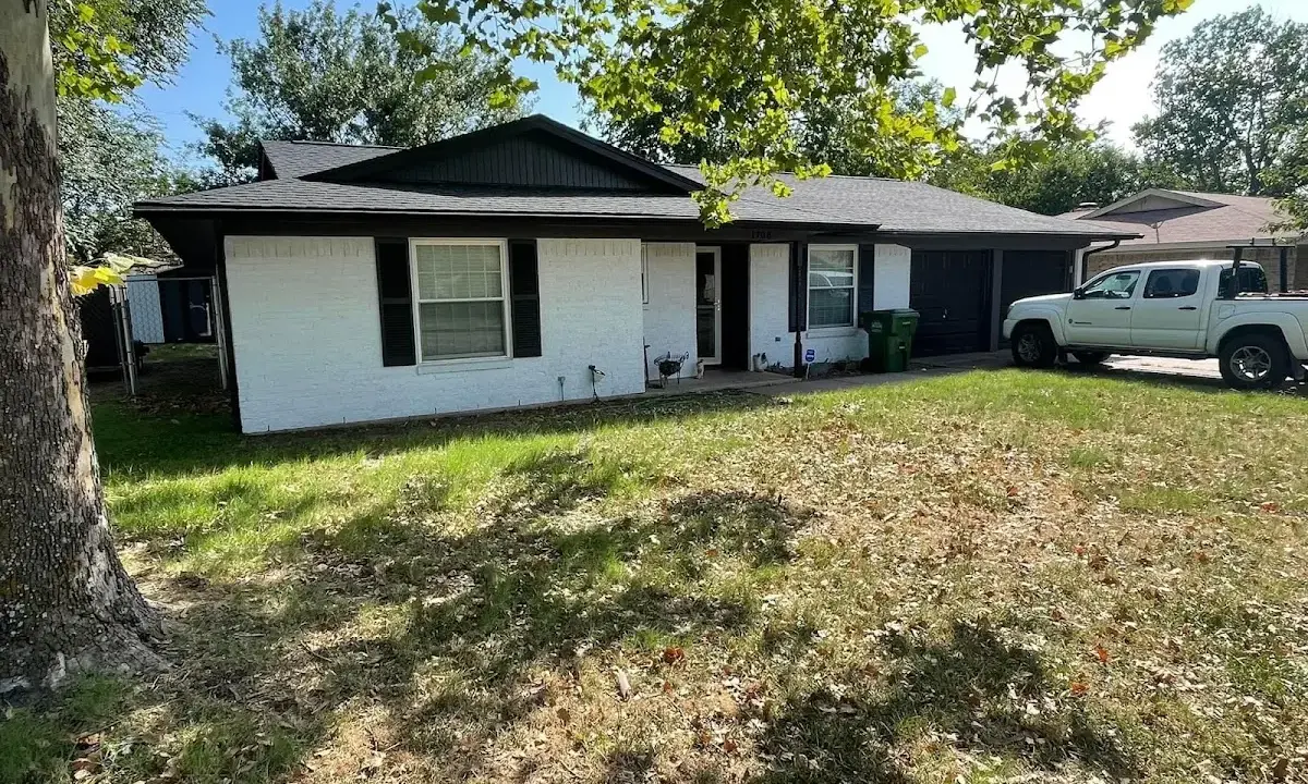 Professional roofing crew working on a residential roof in Sudden Valley